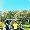Lani Wards wearing her YOUVEE Little Miss Sunshine golf shirt on the course